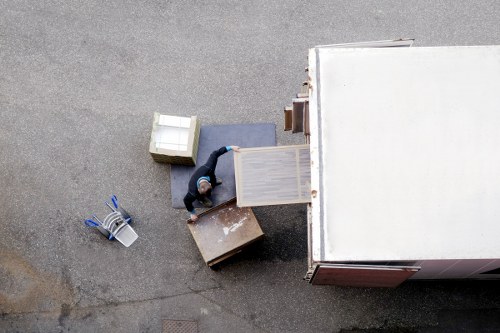 Removal team planning a house move in Southall on a residential street