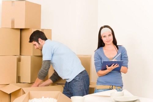 Checklist and packed boxes ready for a Southall home move